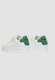 gaelle men's sneakers in white eco-leather with green heel and black logo