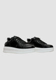 gaelle men's sneakers in black eco-leather with white heel and contrasting logo