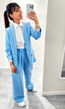 Giacca elegante donna azzurra con manica arricciata