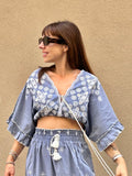 Vibes top donna in denim chambry con dettagli macramè